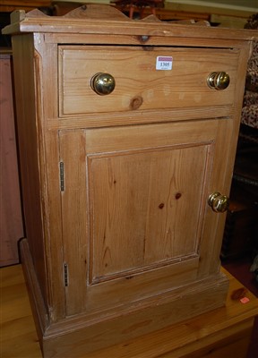 Lot 1304 - A modern pine round cornered chest of two...