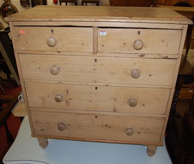 Lot 1422 - A Victorian pine round cornered chest of two...