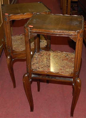 Lot 1429 - A pair of French mahogany two-tier bedside...