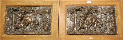 Lot 1024 - Four bronzed composition relief plaques...