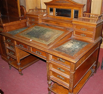 Lot 1442 - A large late Victorian burr oak 'Dickens' desk,...