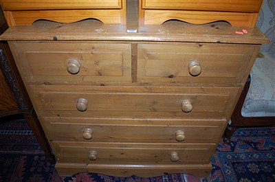 Lot 1454 - A modern pine squarefront chest, of two short...