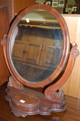 Lot 1455 - A Victorian mahogany oval swing dressing table...