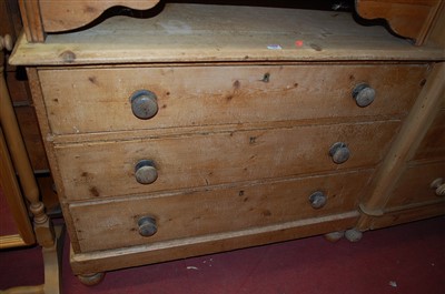 Lot 1463 - A reclaimed pine chest of three long graduated...