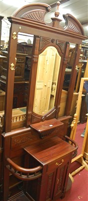 Lot 1465 - A contemporary hardwood mirrorback hall stand,...