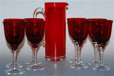 Lot 4 - A set of eight ruby glass wine goblets;...