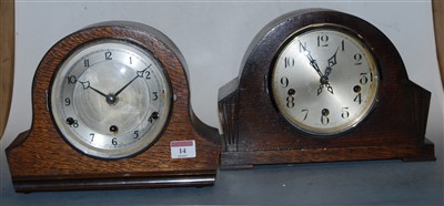 Lot 14 - A 1930s oak cased mantel clock, having a...