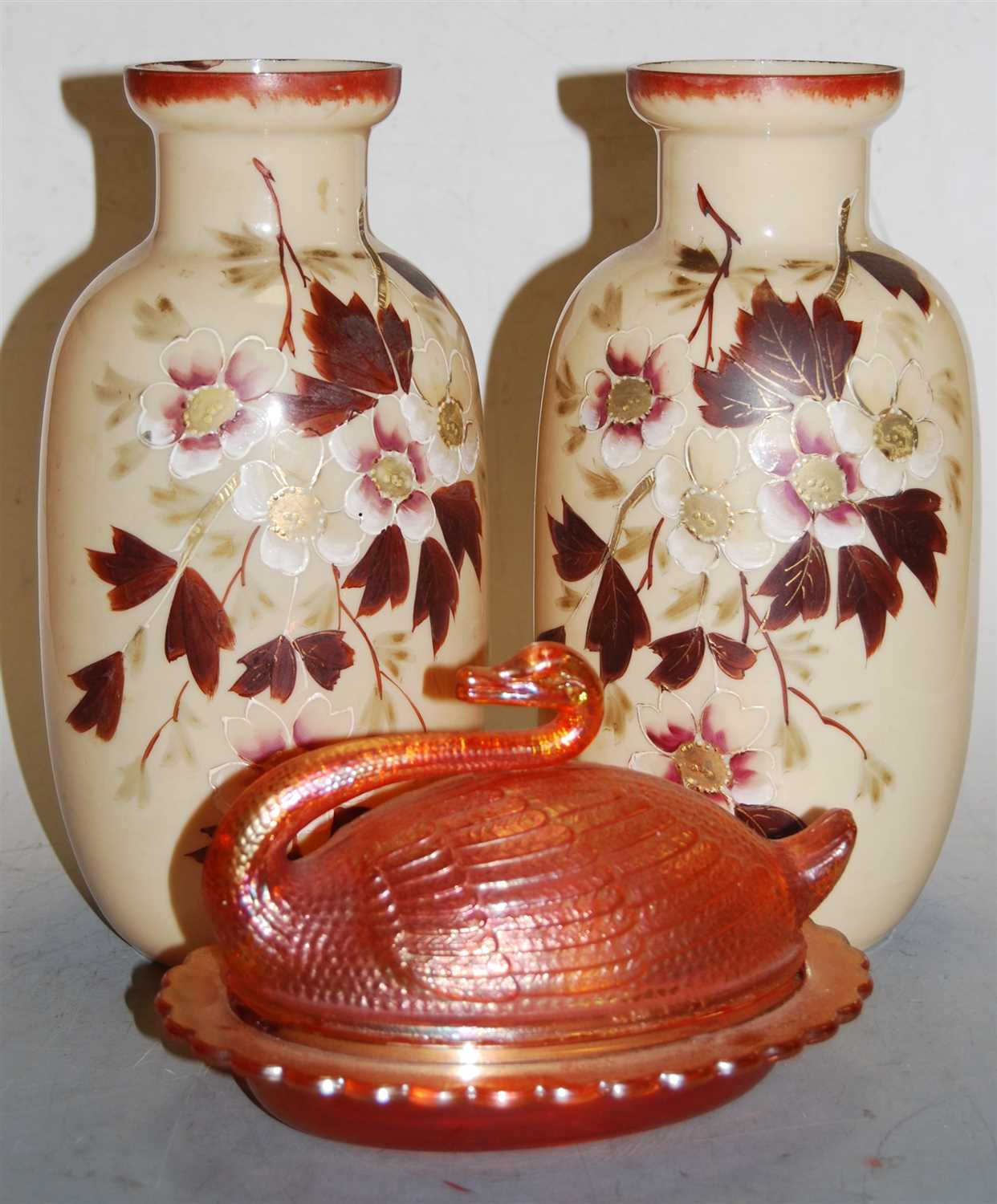 Lot 16 - A pair of Victorian glass vases, overpainted...