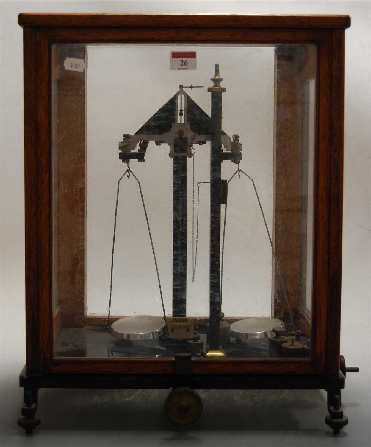 Lot 26 - A set of laboratory scales and weights in...