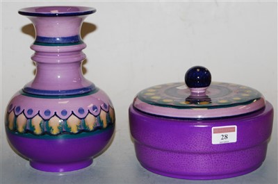 Lot 28 - A Lila Flora Dutch pottery vase, on a purple...