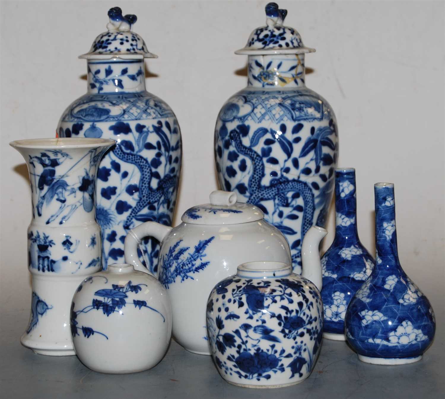 Lot 37 - A Chinese export blue and white Gu shaped...