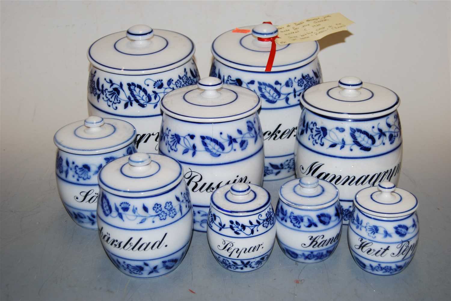 Lot 42 - A set of nine Delft blue and white storage...