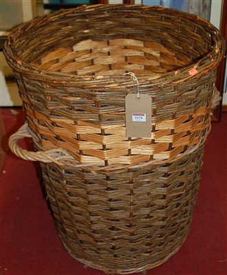 Lot 1078 - A wicker log basket of good size, height 73cm