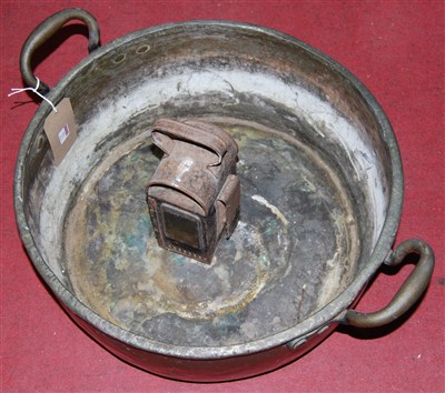 Lot 72 - A large 19th century copper twin handled pan;...
