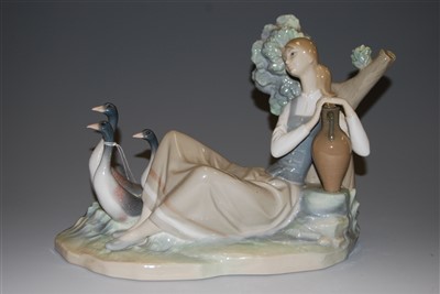 Lot 172 - A Lladro porcelain group, girl with water jug...