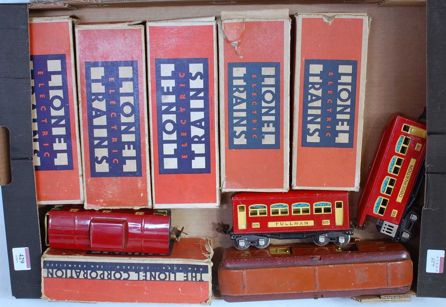 Lot 429 - Eight Lionel bogie coaches; red 2 x 603...