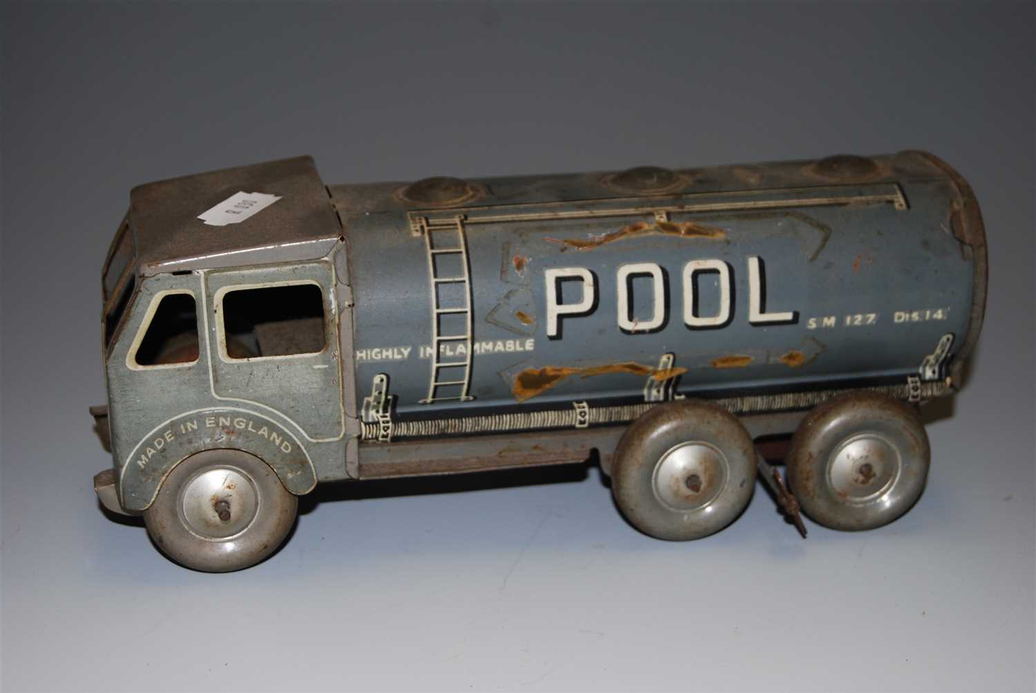 Lot 179 - A tinplate clockwork fuel tanker, advertising "...