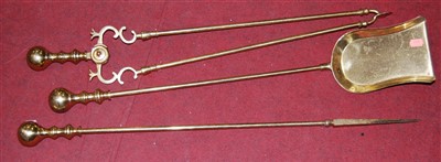 Lot 115 - A set of Victorian turned brass fire tools, to...
