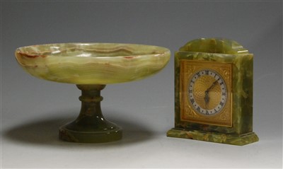 Lot 128 - A mid-20th century onyx cased mantel clock,...