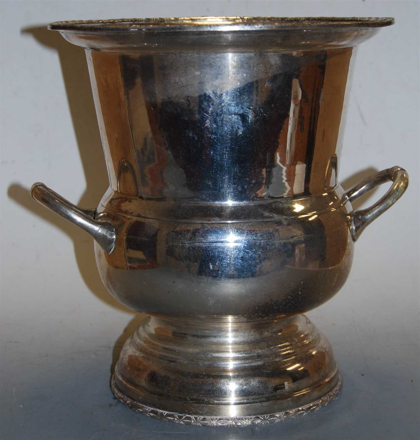 Lot 130 - A large silver plated twin handled wine cooler,...
