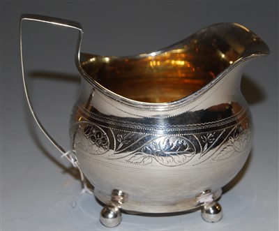 Lot 219 - An early 19th century silver cream jug of oval...