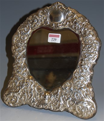 Lot 220 - An easel dressing table mirror, the bevelled...