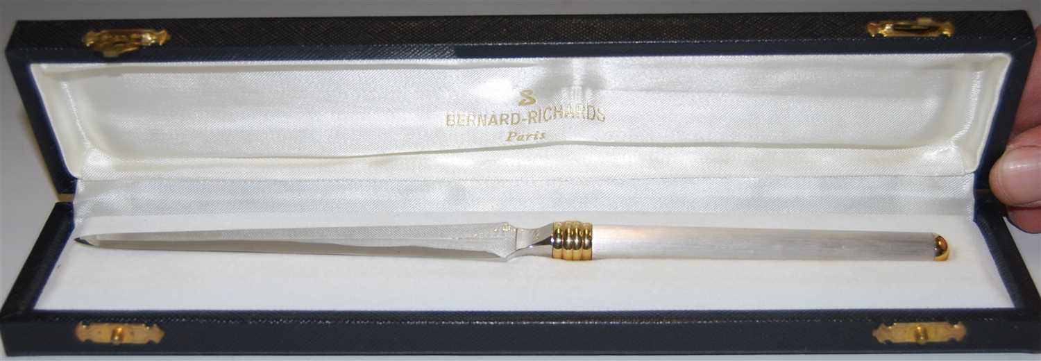 Lot 228 - A boxed Inox of France paperknife with white...