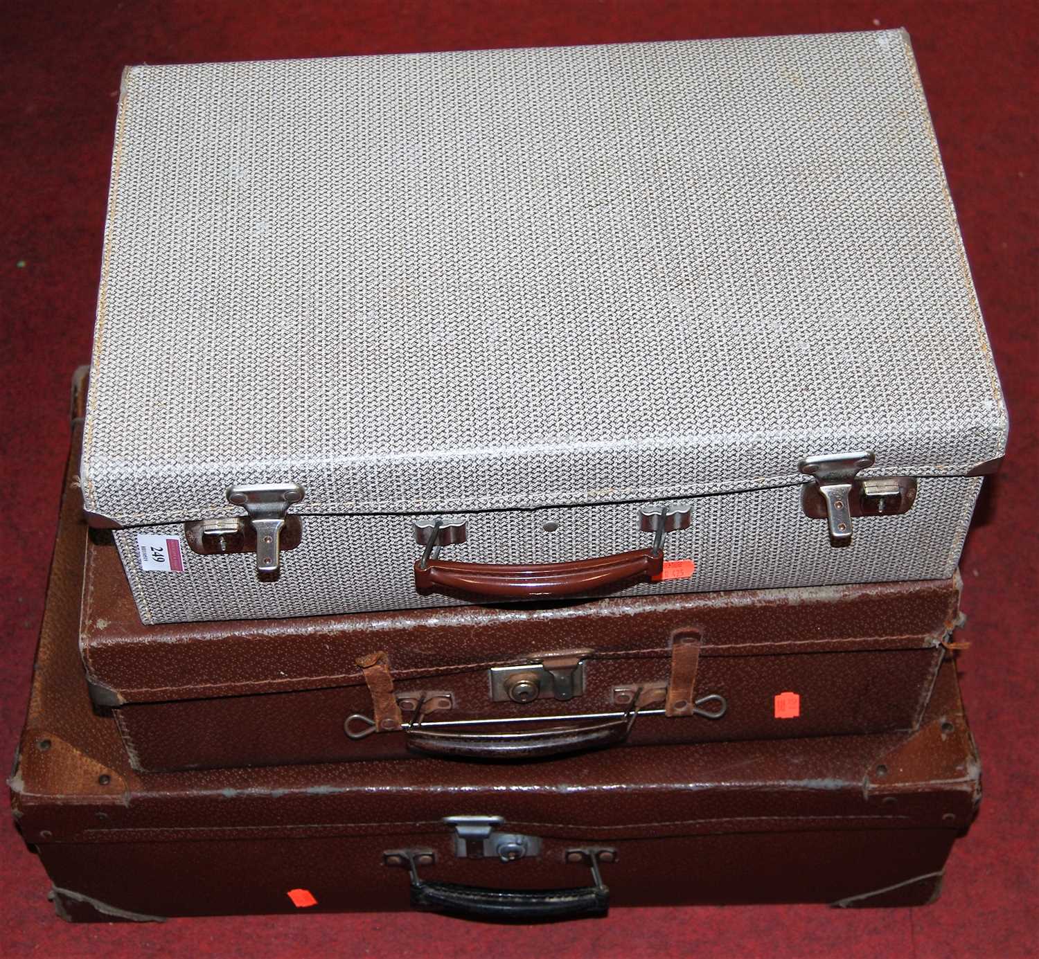 Lot 249 - Four various canvas bound suitcases