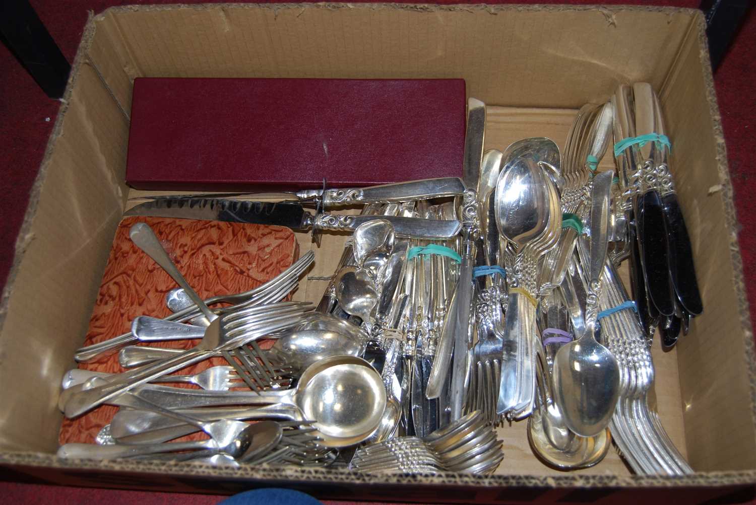 Lot 250 - Assorted loose plated flatwares to include...