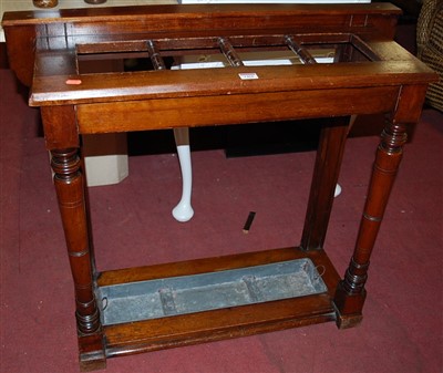 Lot 1468 - An Edwardian walnut four division stickstand...