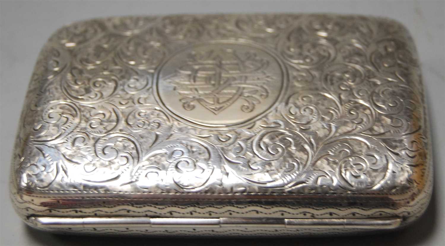Lot 278 - A late Victorian silver pocket cigarette case...