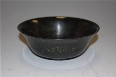 Lot 282 - A spinach jade? bowl on pierced hardwood stand,...