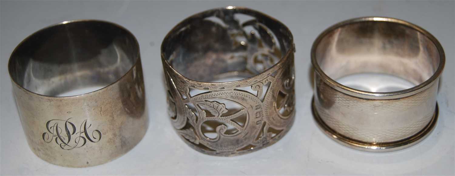 Lot 283 - An Edwardian silver napkin ring of pierced...