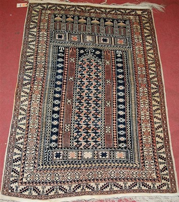 Lot 531 - A Persian woollen rug, having boxed reserves...