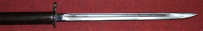 Lot 409 - A 1913 pattern Remington bayonet mounted on an...