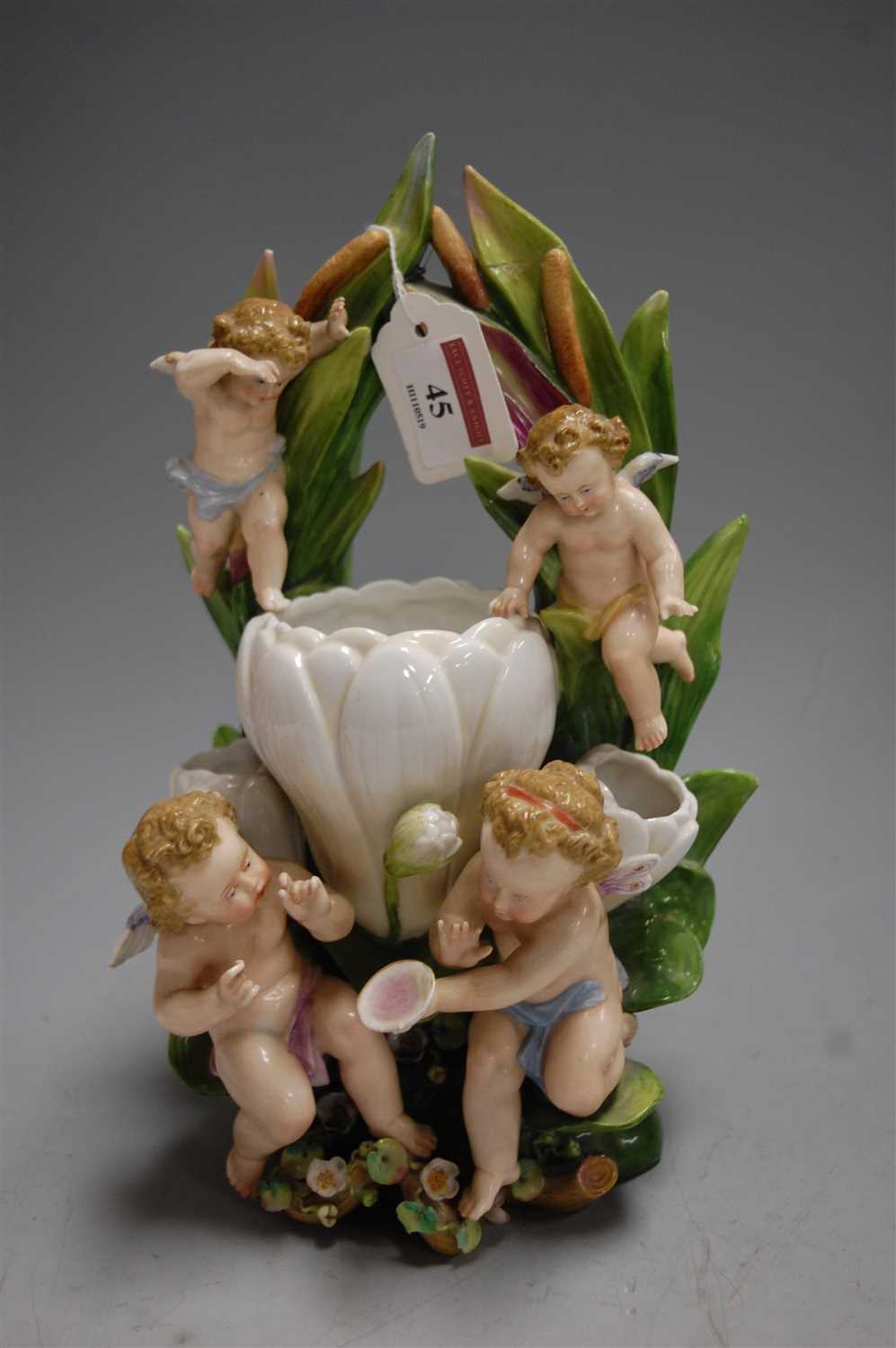 Lot 45 - A continental porcelain spill vase, modelled...
