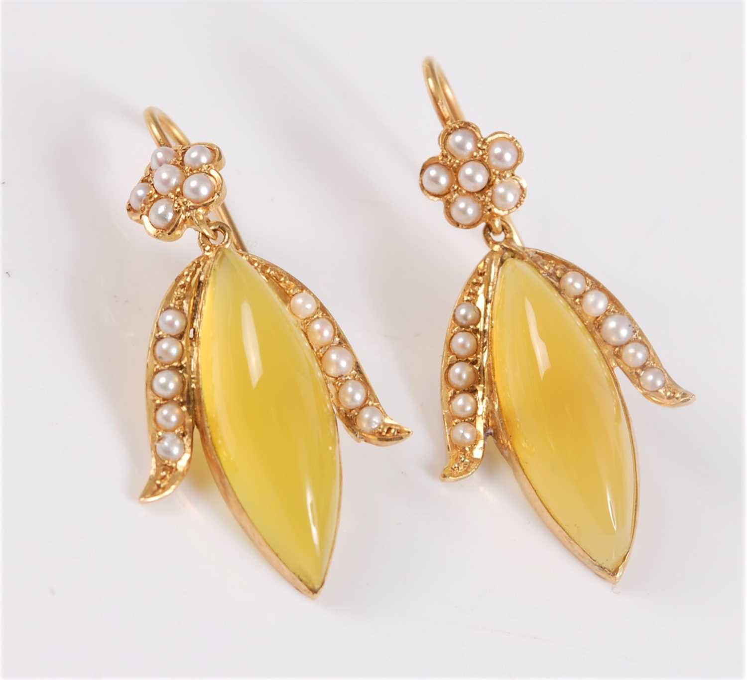Lot 1276 - A pair of seed pearl and yellow hardstone...