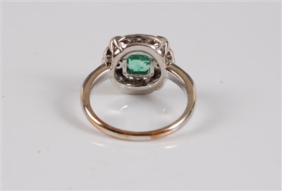 Lot 1261 - An early 20th century emerald and diamond ring,...