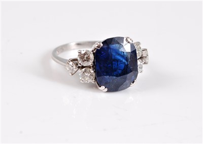 Lot 1223 - An 18ct sapphire and diamond ring, the old...