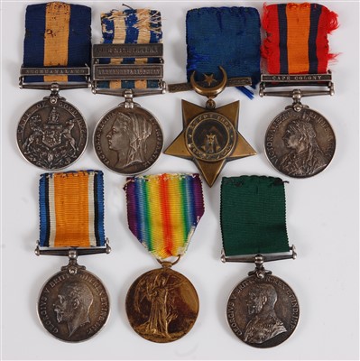 Lot 320 - A Victoria/George V group of seven medals to include