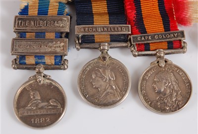 Lot 320 - A Victoria/George V group of seven medals to include