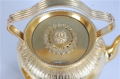 Lot 1214 - A mid-Victorian silver gilt four-piece tea set,...