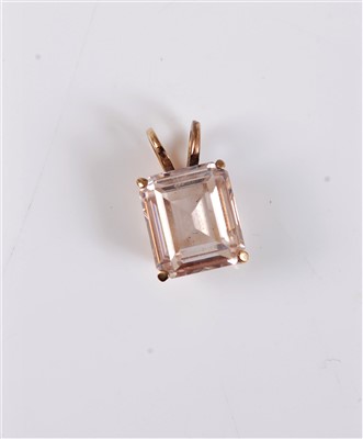Lot 2583 - A pale pink zircon pendant, the emerald cut...