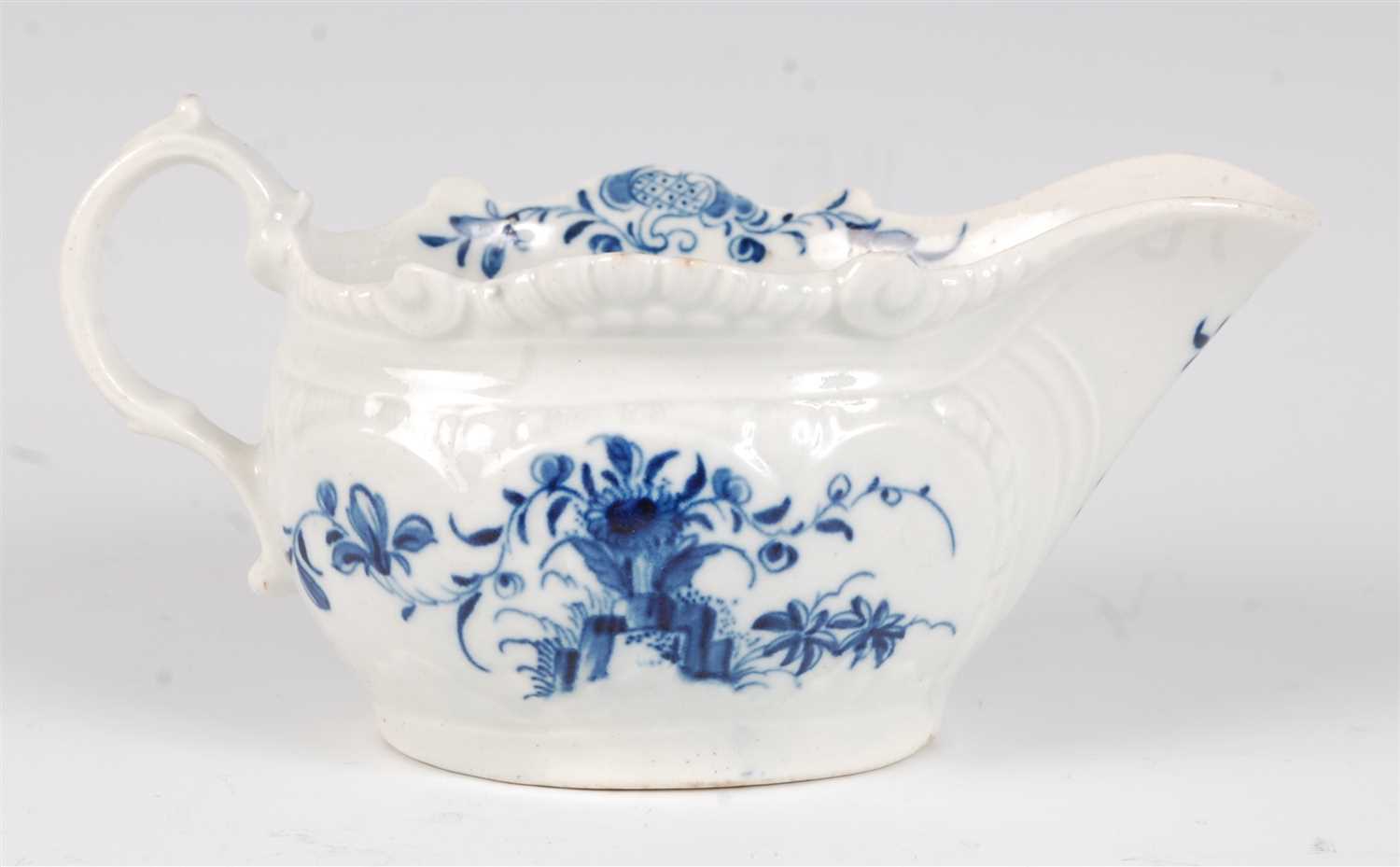 Lot 1087 - A Worcester porcelain press-moulded sauceboat,...