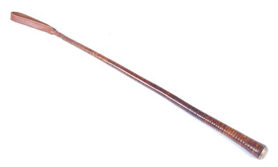 Lot 16 - An early 20th century leather covered riding crop