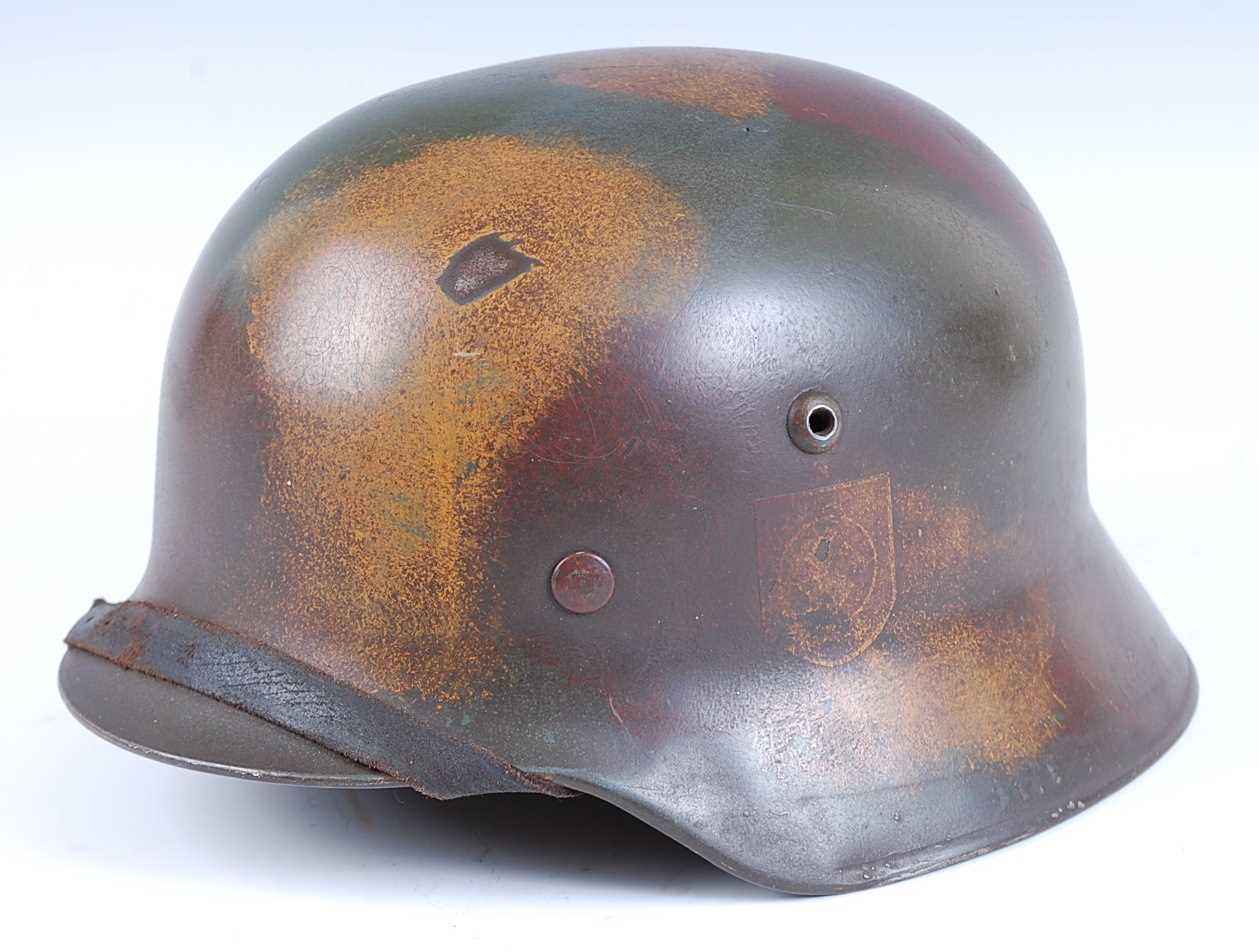Lot 18 - A German M1935 pattern steel helmet
