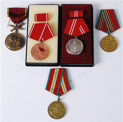 Lot 300 - A collection of five medals