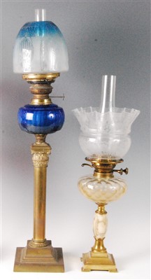 Lot 1404 - A late Victorian brass pedestal oil lamp,...