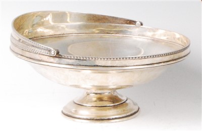 Lot 1180 - A George V silver basket, having egg and dart...