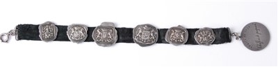 Lot 1306 - Political jewellery; a bracelet recalling the...